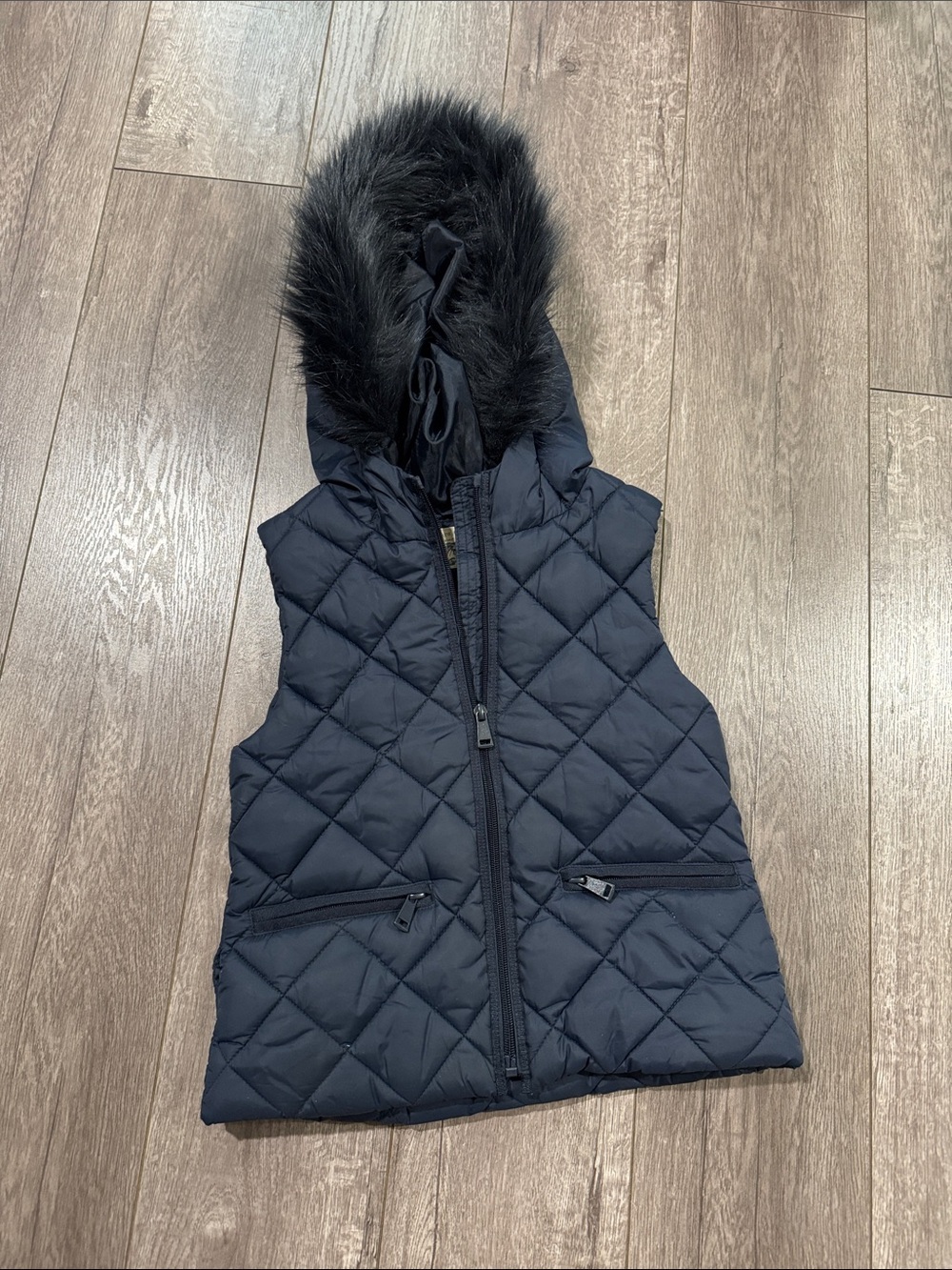 Girls Zara navy puffer vest with fir 7/8